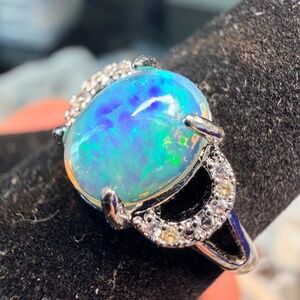1.4 carat Ethiopian opal adjustable ring blue green flash